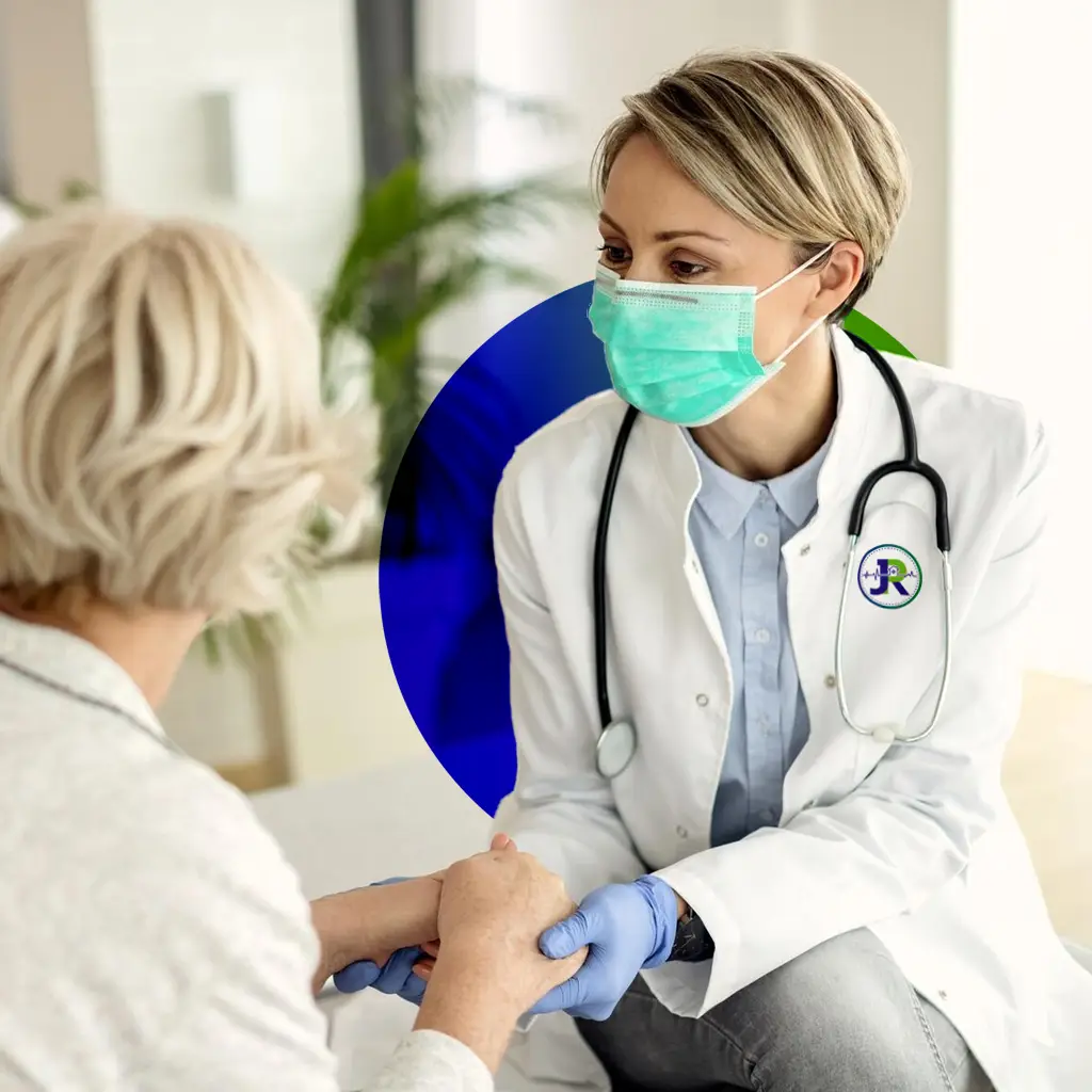 a female doctor at home, wearing a lab coat, mask and gloves and holding an old lady's hands.