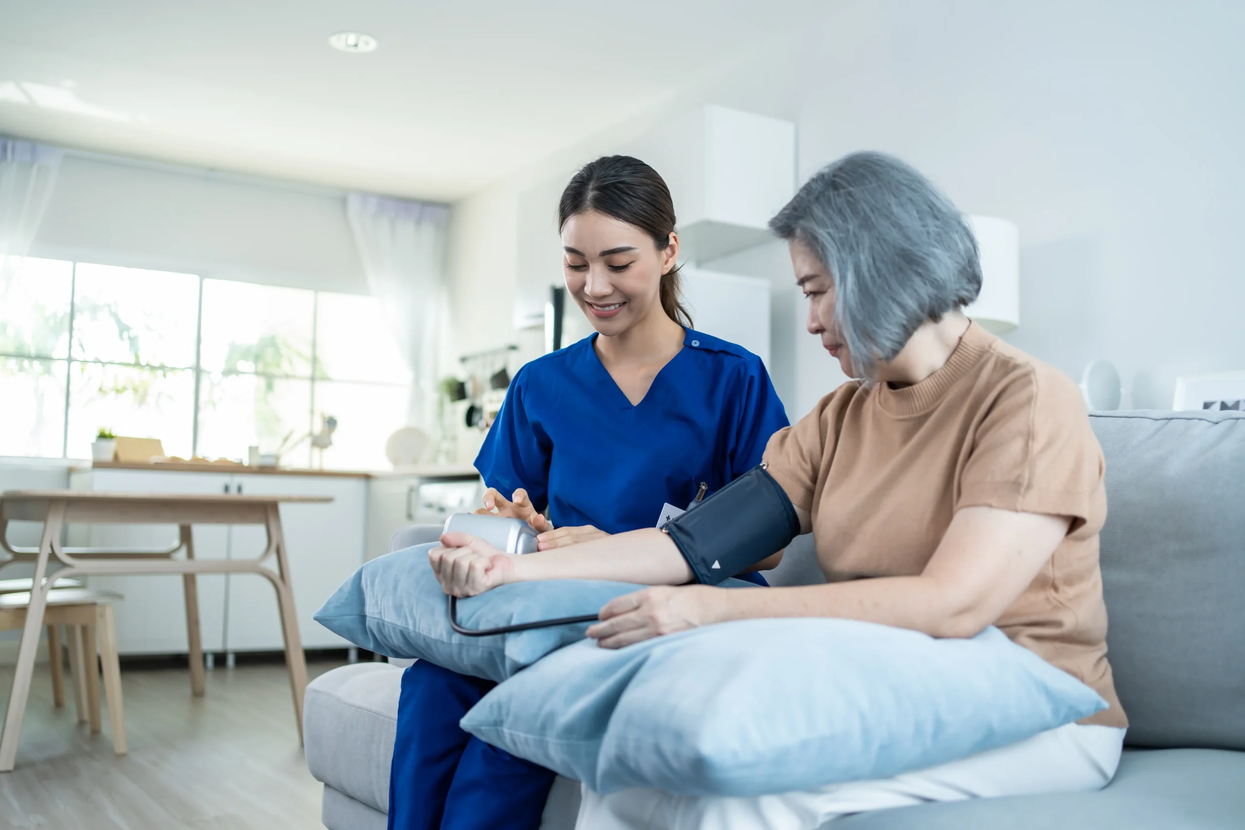 asian-caregiver-doctor-examine-older-patient-use-b-2025-03-25-07-56-54-utc
