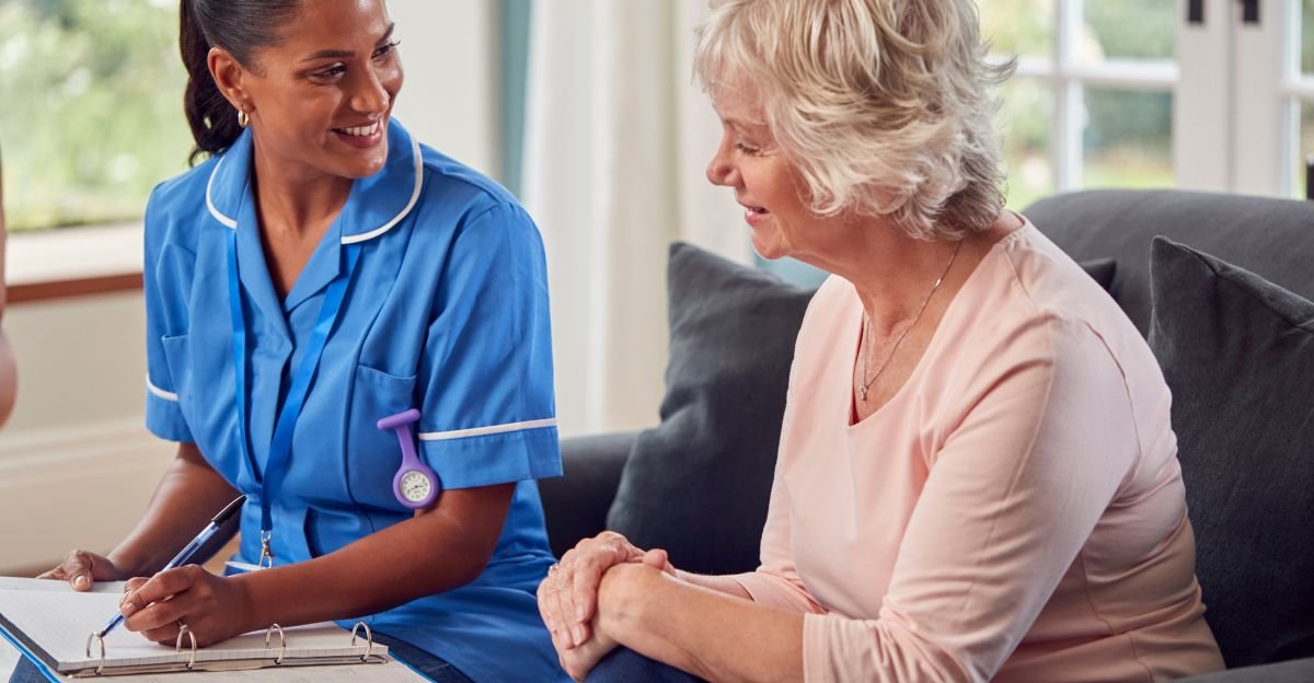 Nurse taking care of Elderly Woman