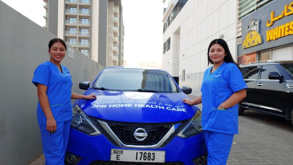Female nurses in uniform ready for elderly home health care visit in Dubai.