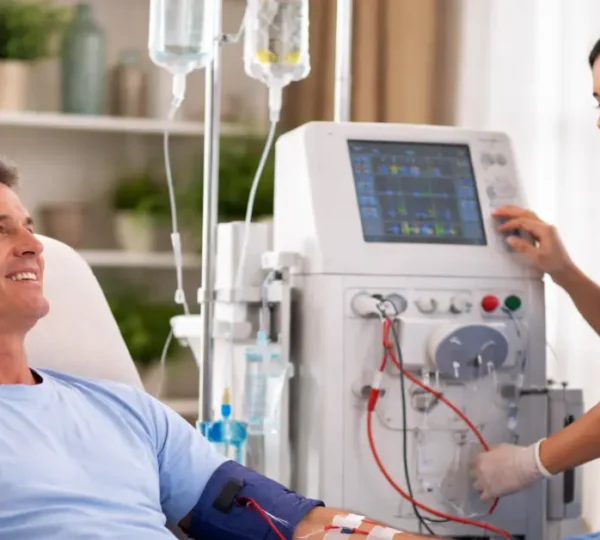 Patient receiving dialysis treatment comfortably at home with medical support